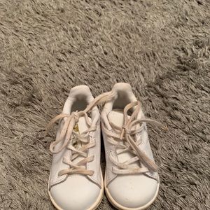 Kids white and gold Adidas sneakers